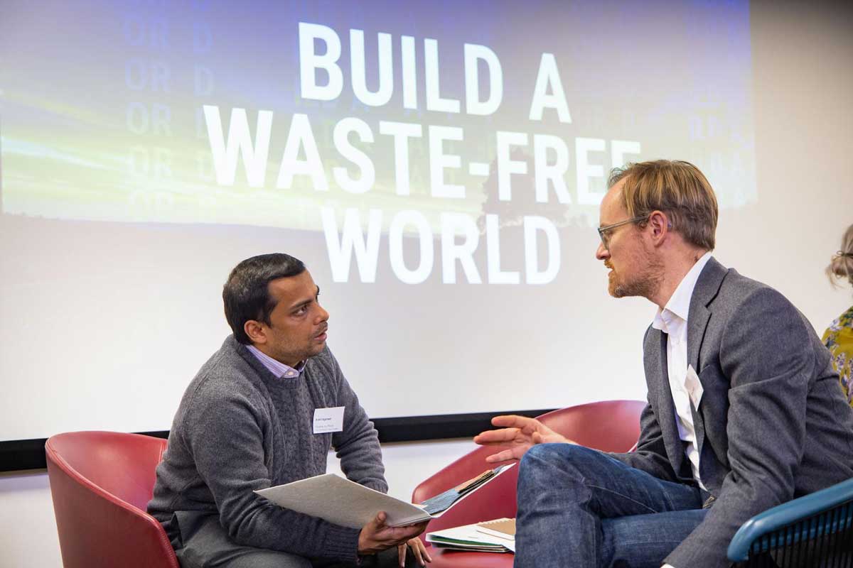 Ankit Argarwal (Fleather) talks with an advisor at the Deloitte networking event