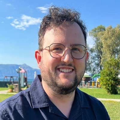 Dr Adam Tomassi-Russell