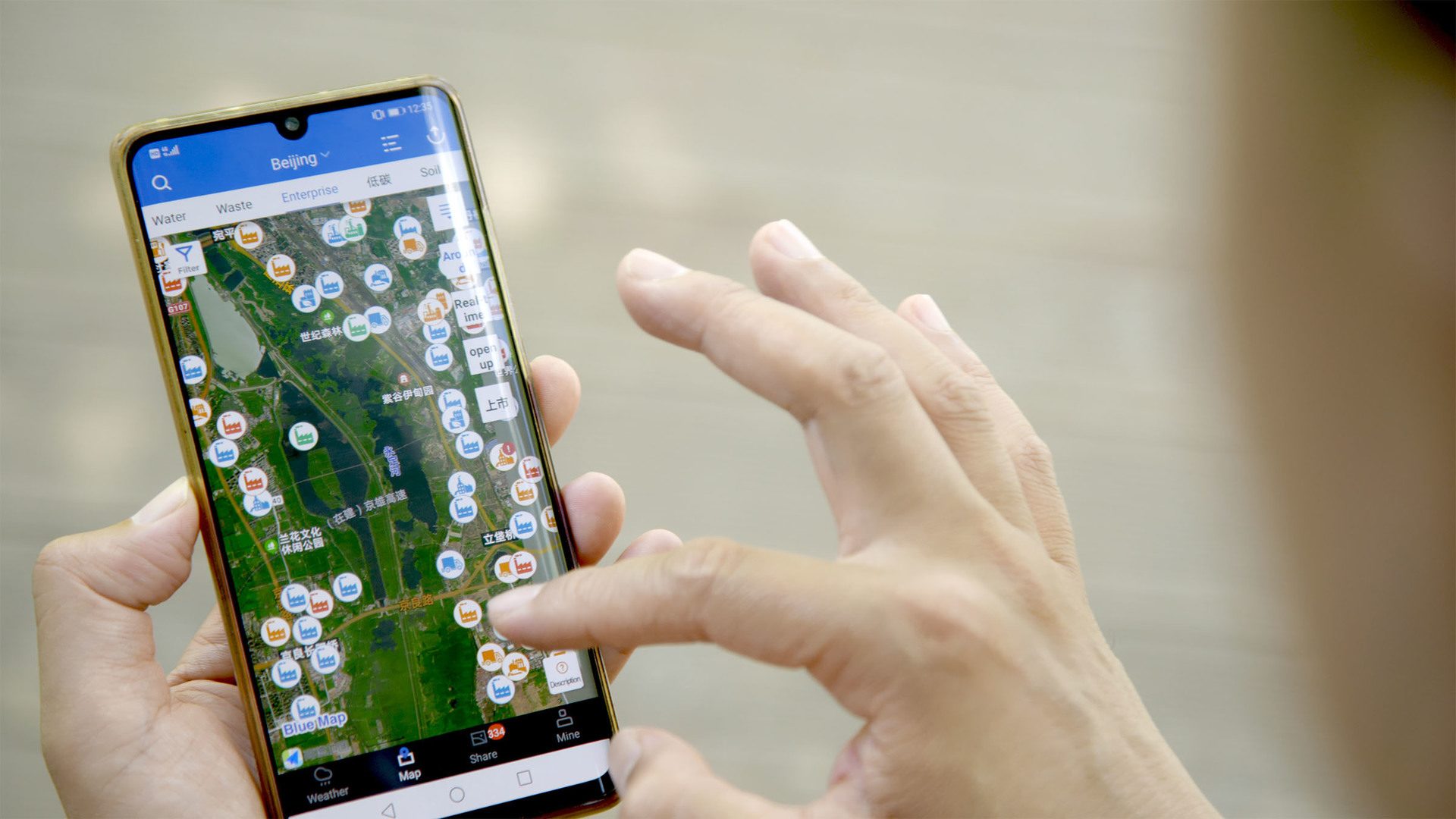 Blue Map App in use on phone