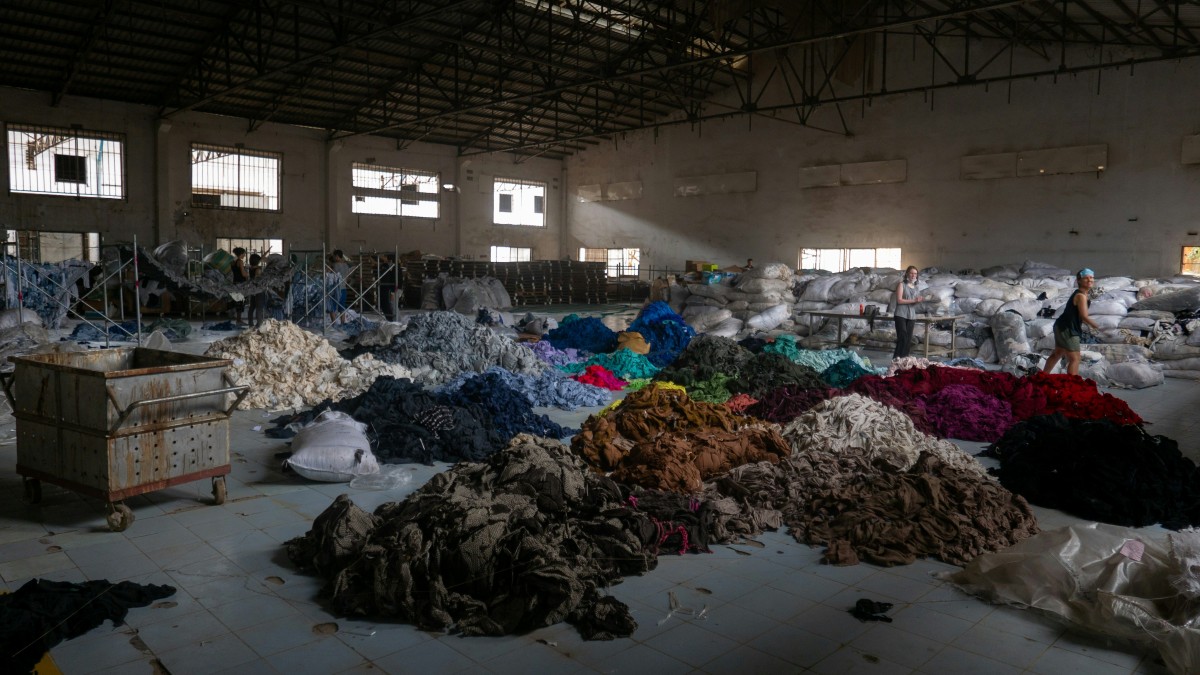 Clothing waste lying on a factory floor