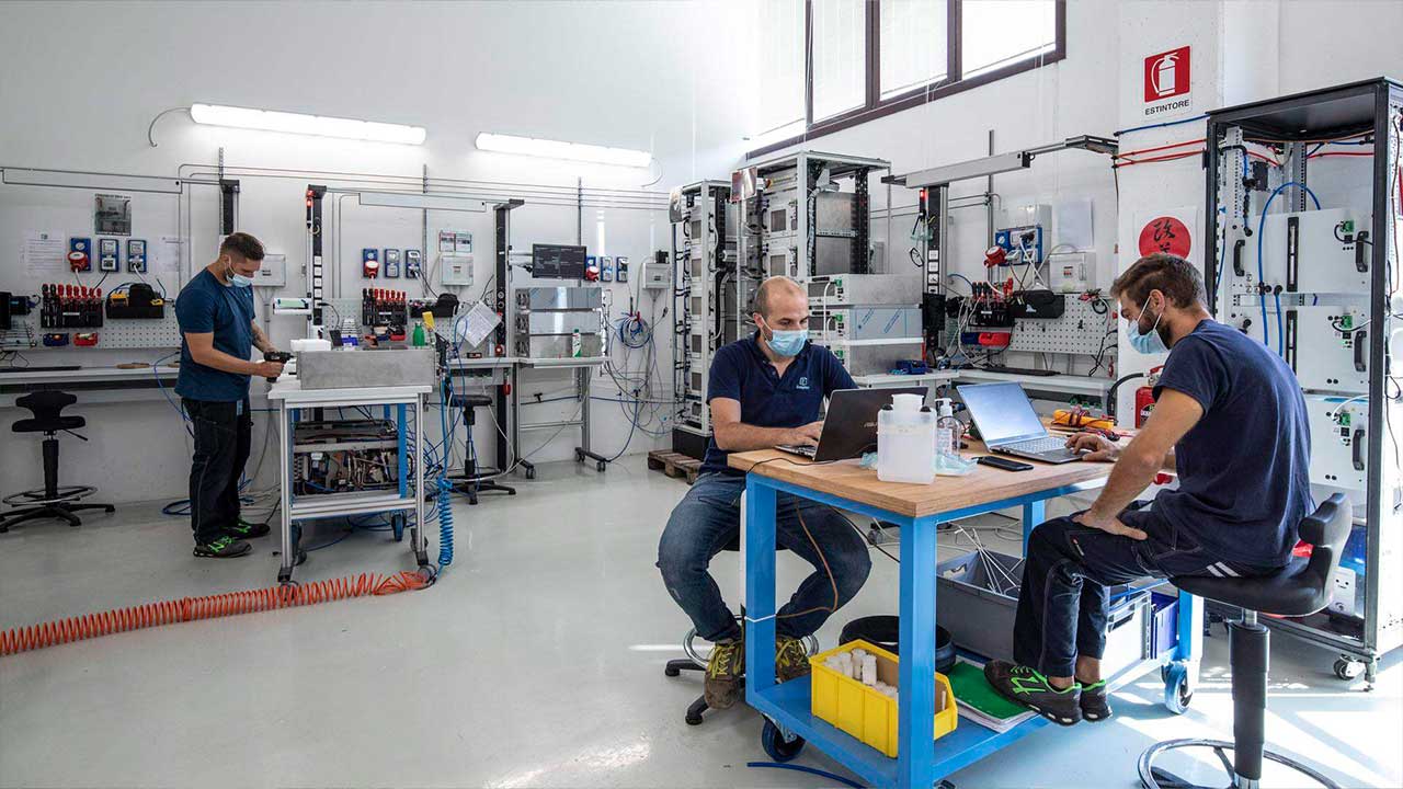 Enapter engineers work on their green hydrogen electrolysers