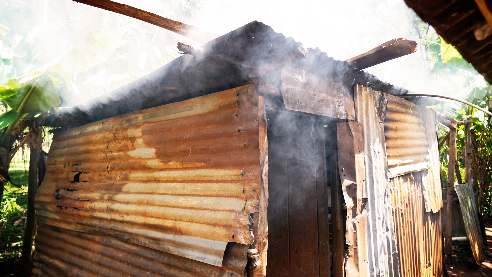 Hut with tradtional cooking stoves before Mukuru Clean Stoves