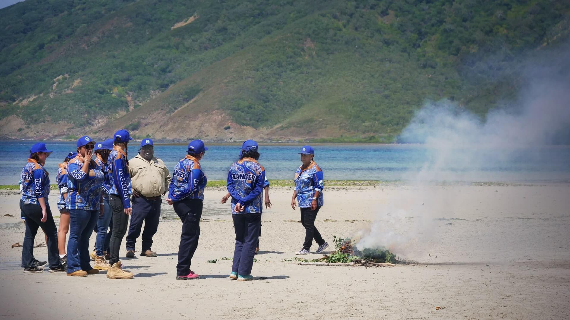 Indigenous Women of the Great Barrier Reef beach fire