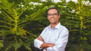 Kheyti Co-founder CEO Kaushik Kappagantulu infront of leaves