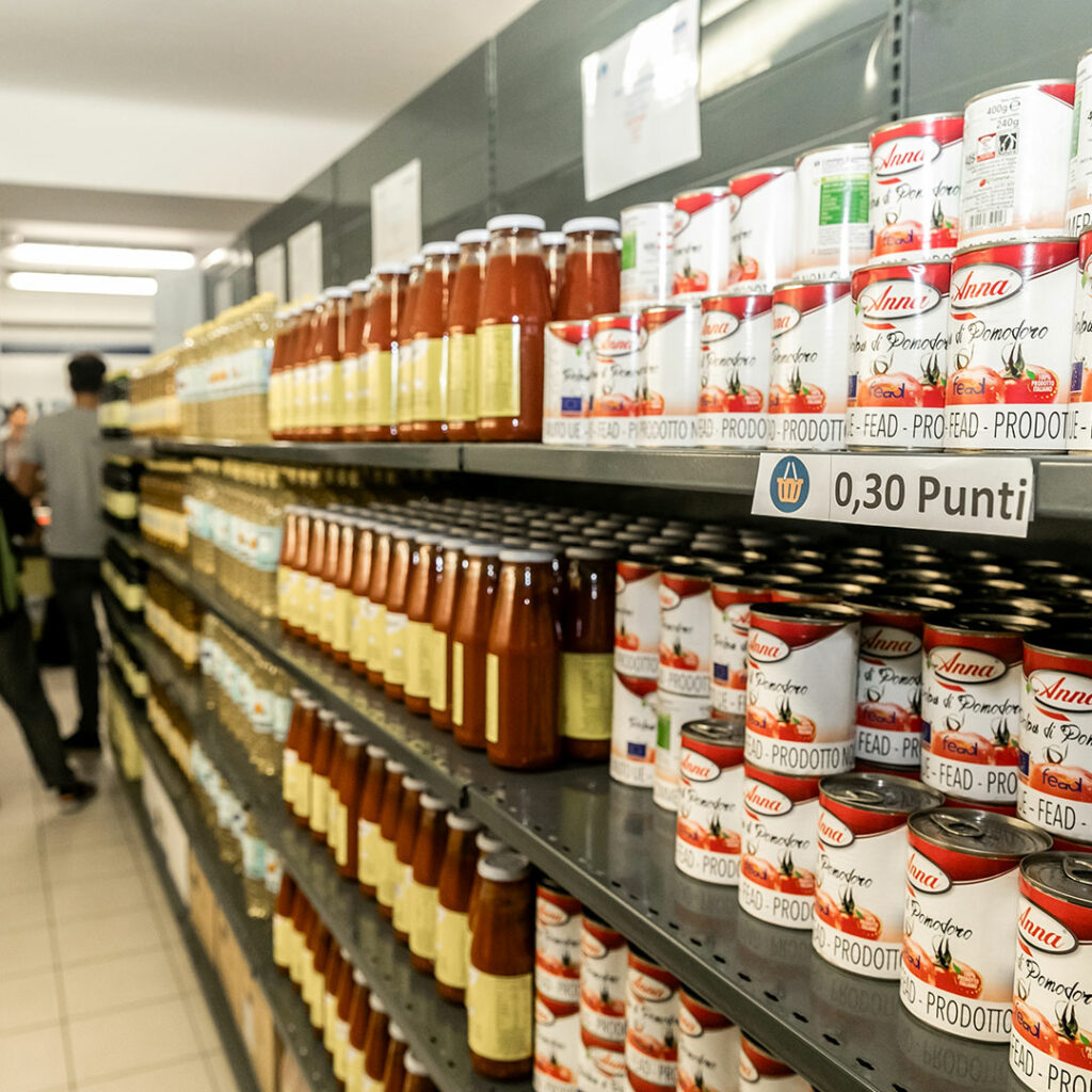 Milan waste hub shelves of food