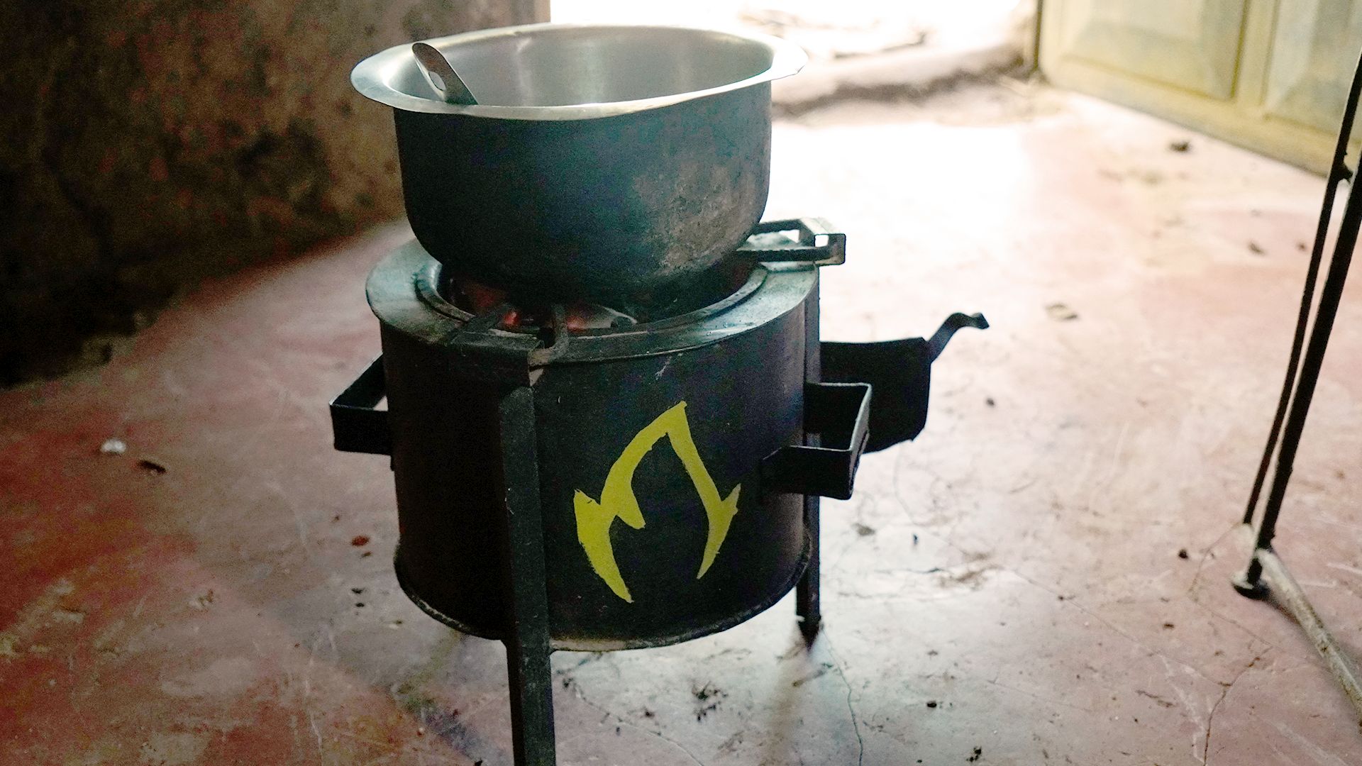 Mukuru Clean Stove inside hut