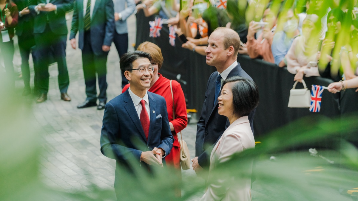 Prince William with Ms Sim Ann, Senior Minister of State for Foreign Affairs and National Development and Changi Airport CEO James Fong