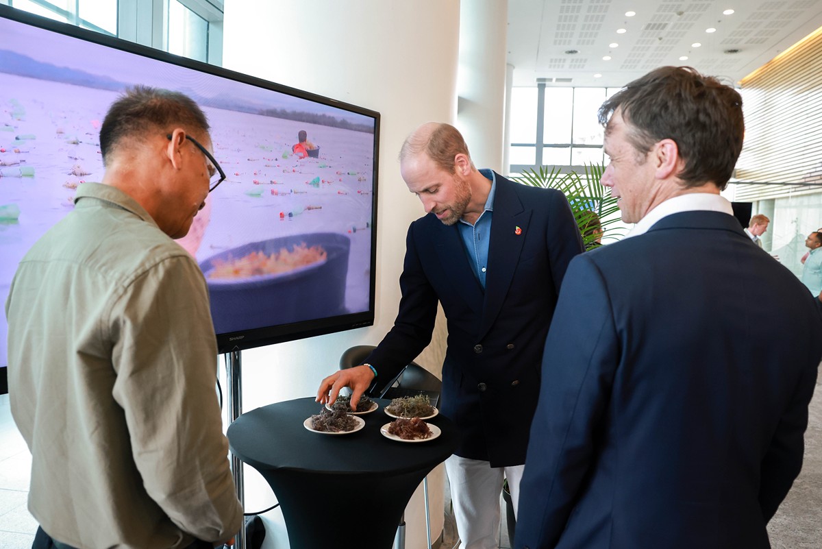 Prince William speaks with Amado Blanco and Nicholas Hill from Coast 4C at The Earthshot Prize Seaweed Showcase in Cape Town