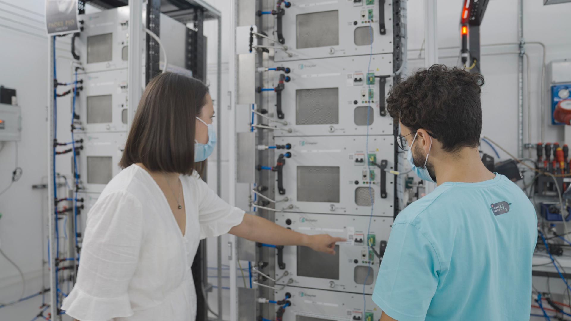 Vaitea Cowan inspecting Enapter electrolyser