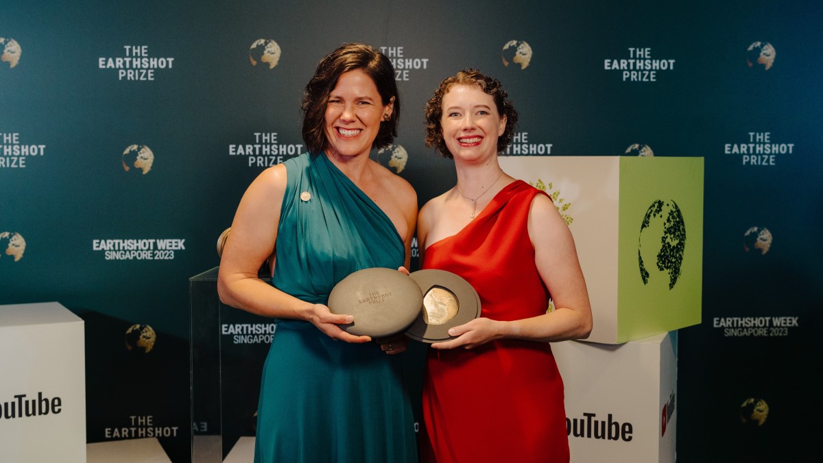 Meaghan Brosnan and Emily Owen from WildAid with their 2023 Earthshot Prize Winners medals