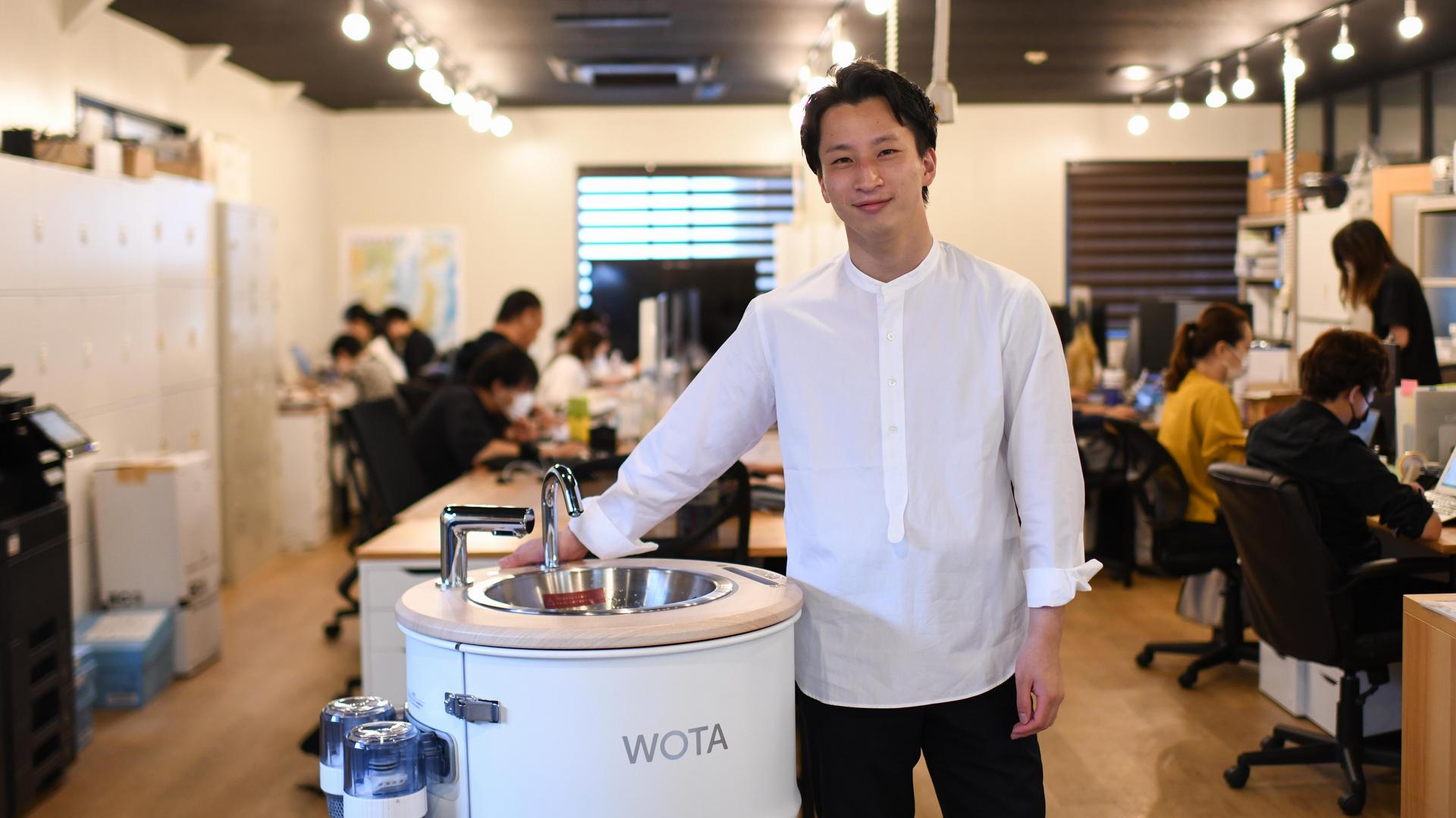 WOTA BOX Yosuke Maeda with solution in office